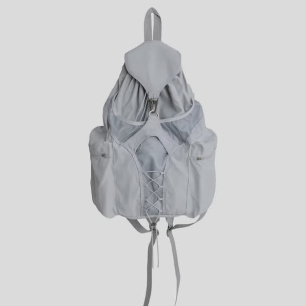 오호스 리버시블 스트링 백팩