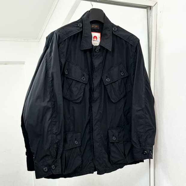 빔즈 플러스 X 코마츠 정글 퍼티그 나일론 자켓