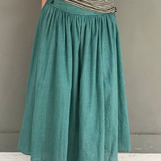 side button point mint long skirt
