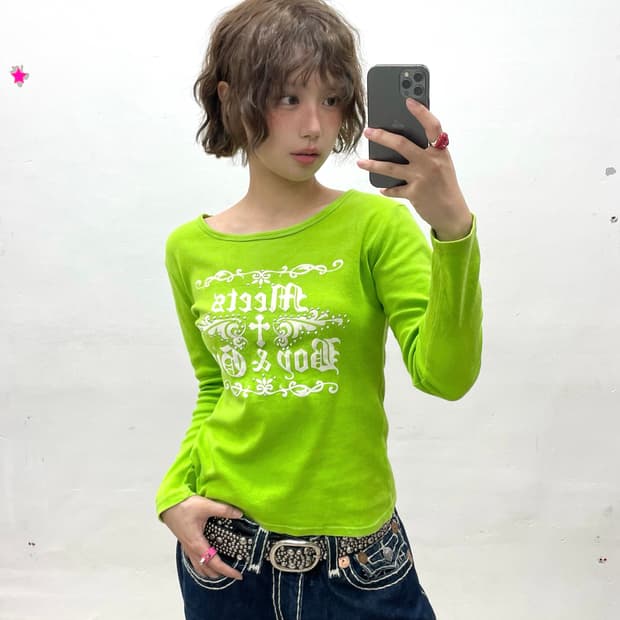 White lettering cubic green long-sleeve 