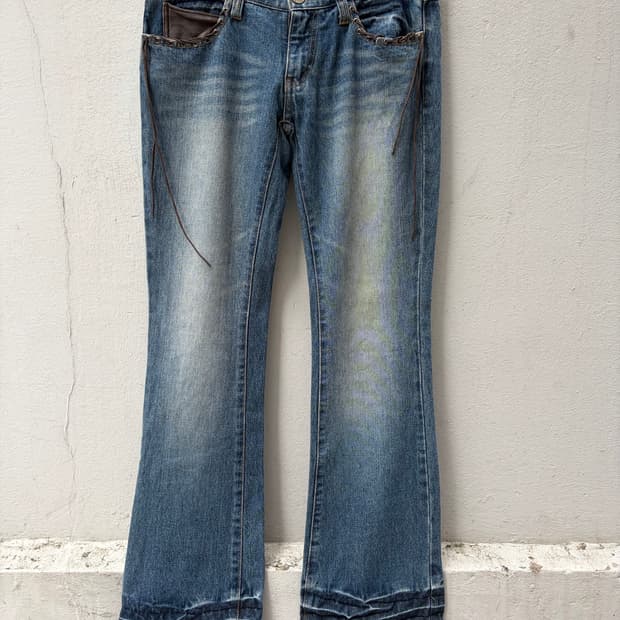 low box tassel detail denim pants