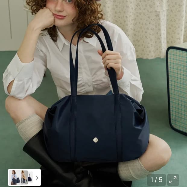 히어리 오로라 셔링 더플백 네이비