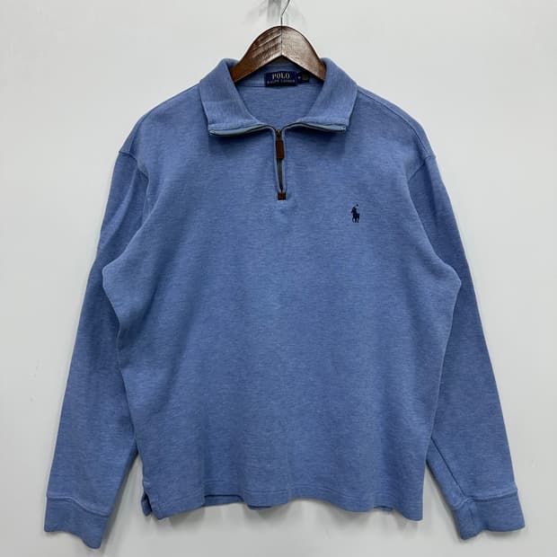 폴로 뮤트 블루 반집업 니트