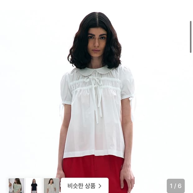 파르티멘토 우먼 open back ribbon puff blouse