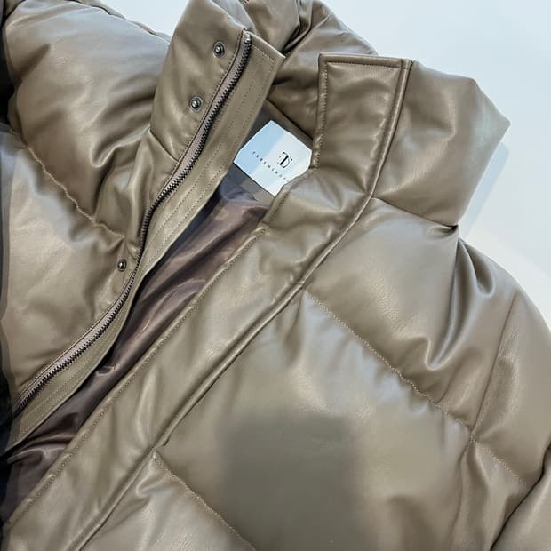 트리밍버드 레더 패딩 모카그레이