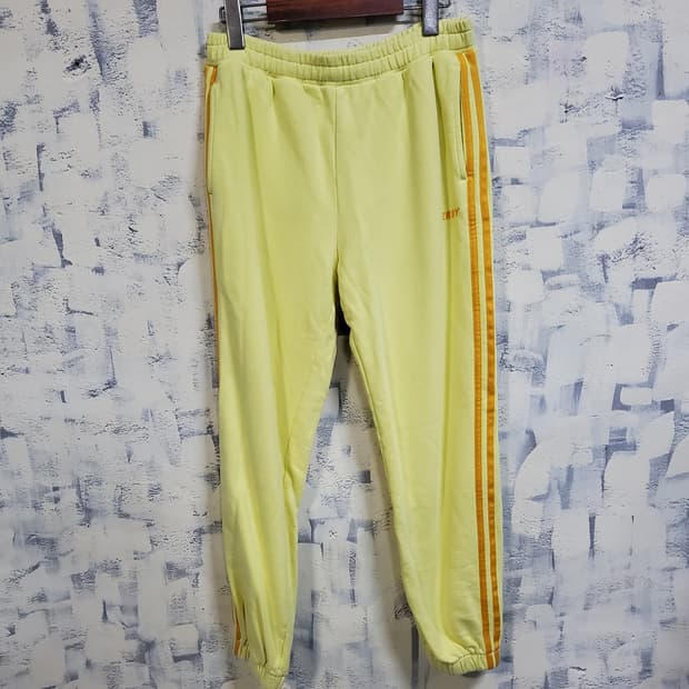 널디 옐로우 트랙탑 조거 팬츠 