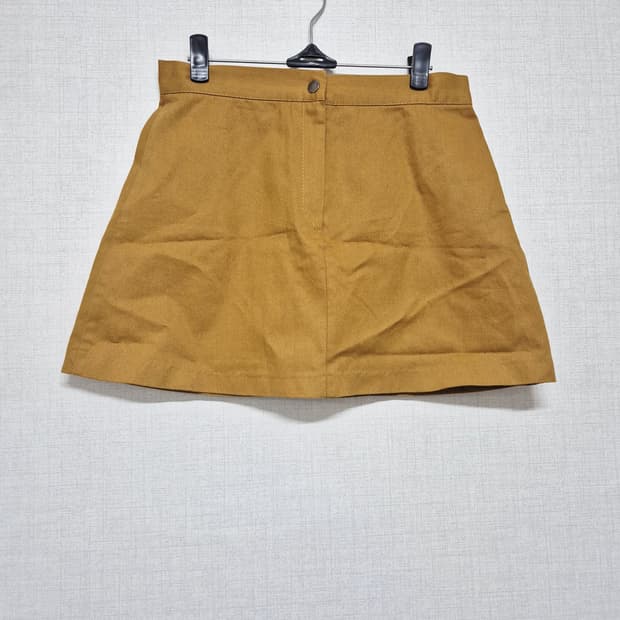 머스타드 미니 스커트