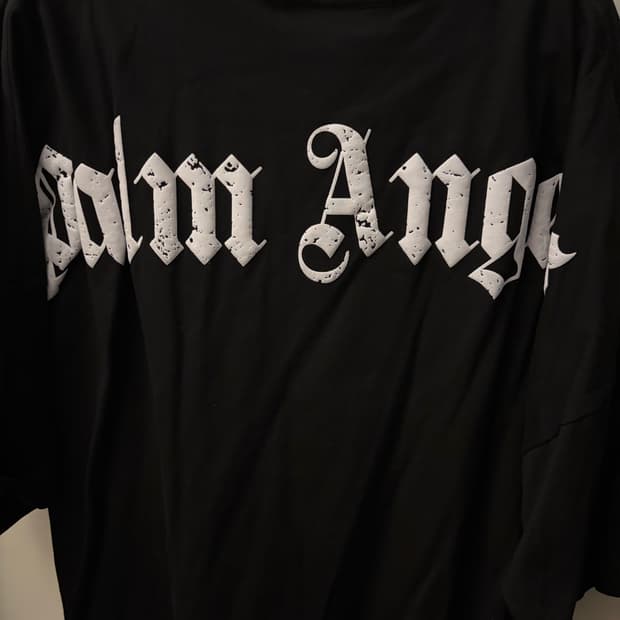 팜엔젤스 백 커브드 로고 오버 티 블랙