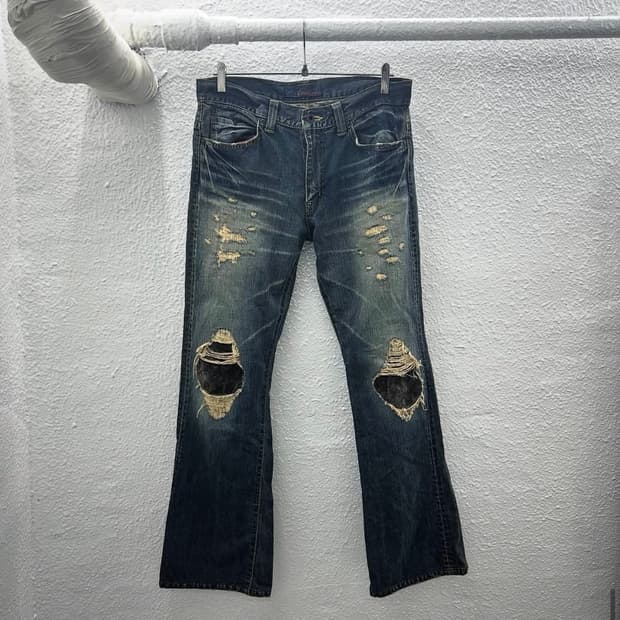 Python damage bootscut jeans 