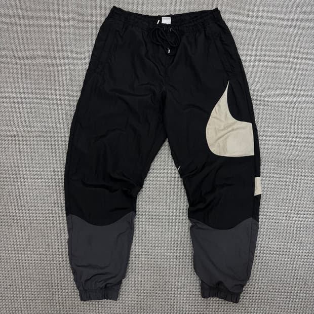 Nike NSW 스우시 우븐 라인드 팬츠
