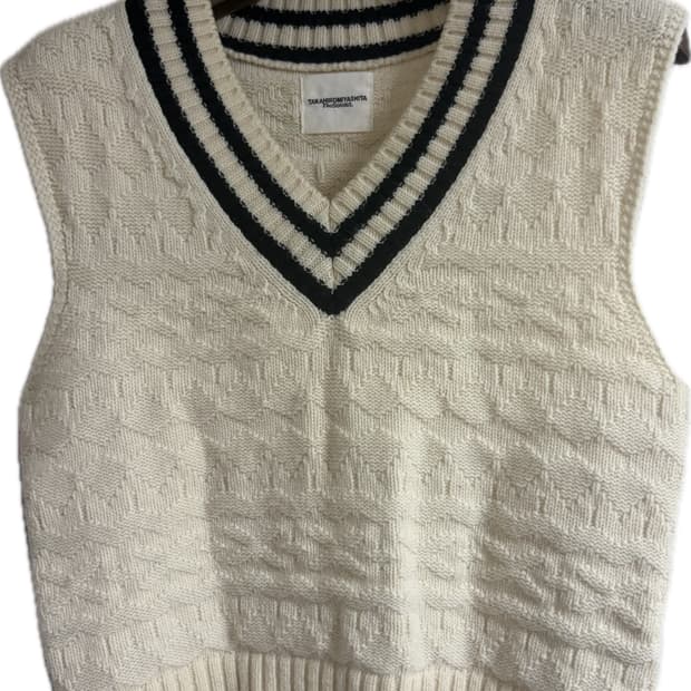 솔로이스트 니트 베스트