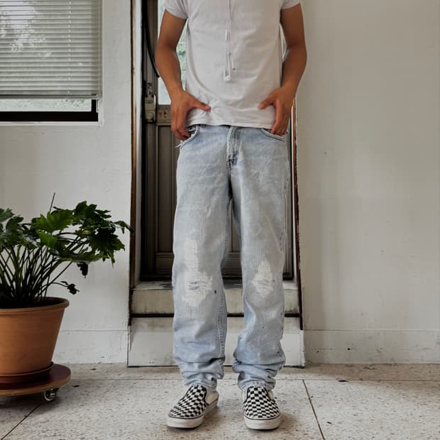 Levi’s 550 디스트레스드 워시드 데님 팬츠