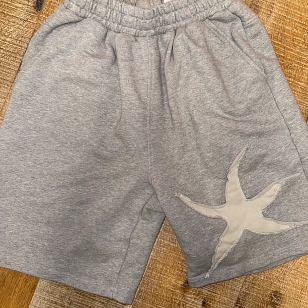 더콜디스트모먼트 팬츠 starfish half sweat pants