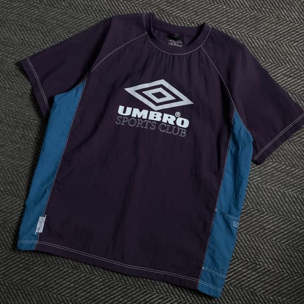 엄브로 크리스피 타슬란 피스테 퍼플 웜업 반팔y 3992