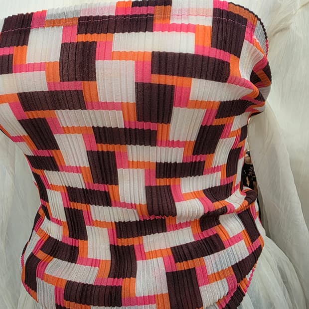 PLEATS PLEASE
