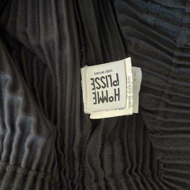 옴므플리츠 바지