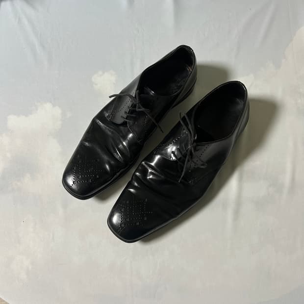 Prada medallion derby shoes