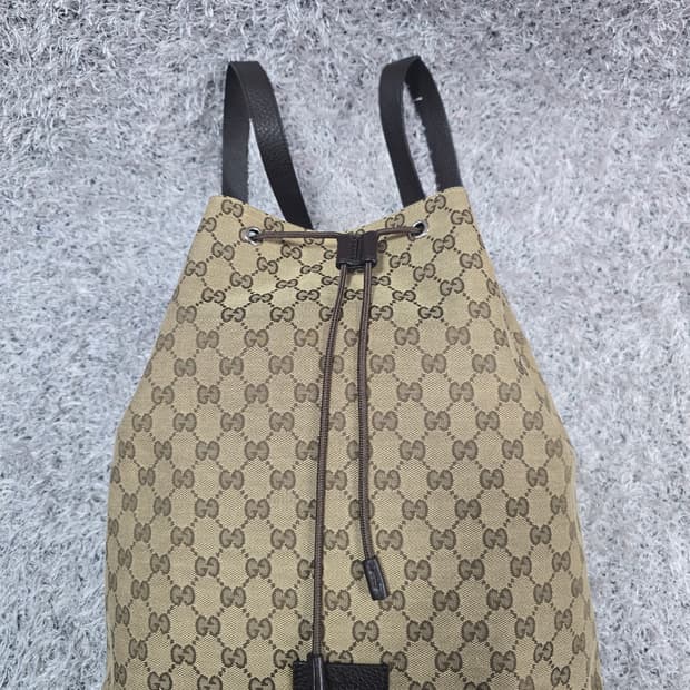 구찌 GG 캔버스 드로스트링 백팩