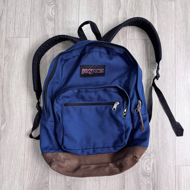 잔스포츠 네이비 스웨이드 백팩