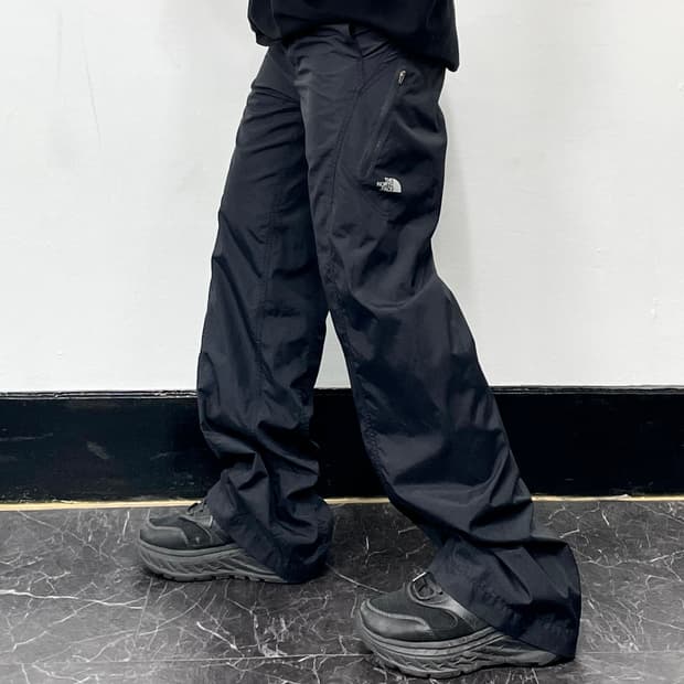 S 노스페이스 비대칭 테크니컬 플라이트 와이드 트랙팬츠