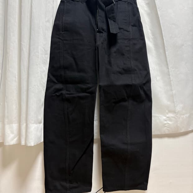 Lemaire. Twisted denim pants