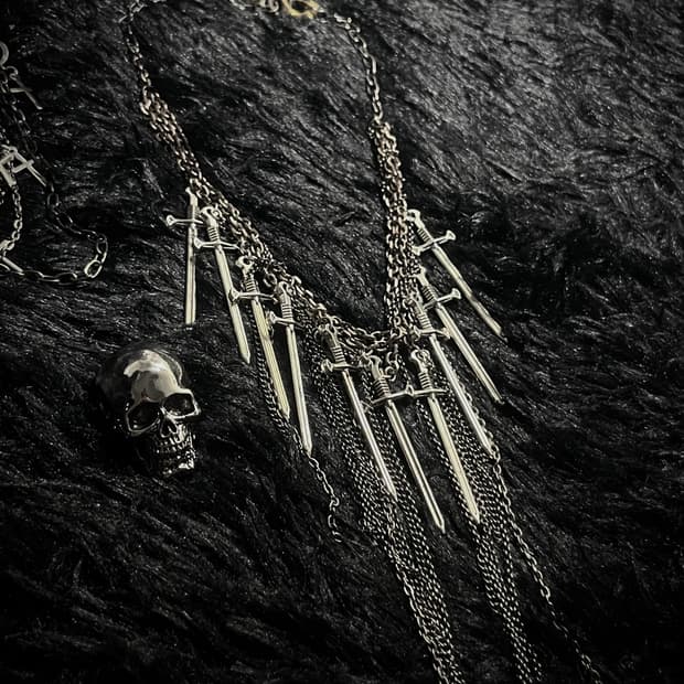 A sword layering necklace