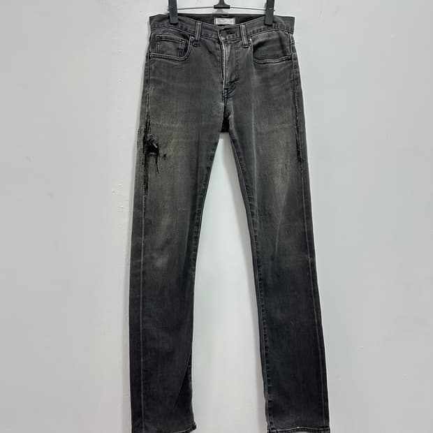Vintage gray destroyed denim jeans