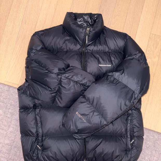 [L] 디스이즈네버댓 패딩