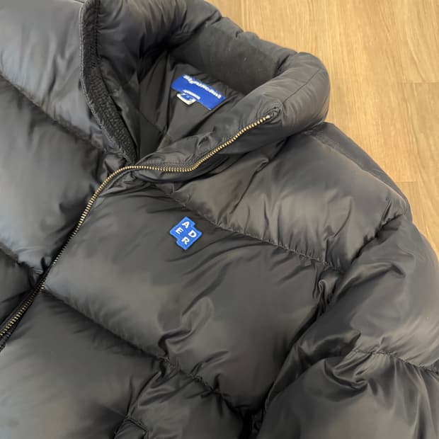 아더에러 시그니피컨트 TRS/BL 태그 퍼퍼 자켓 01 느와르 패딩