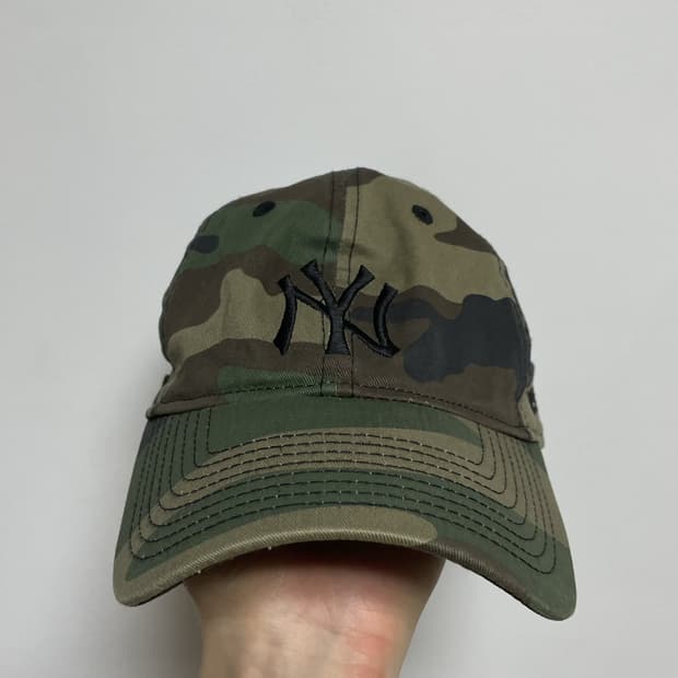 디스이즈네버댓X뉴에라 카모 볼캡