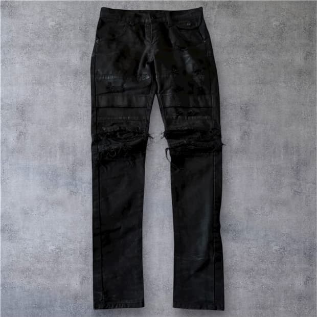 Damaged coted biker jeans