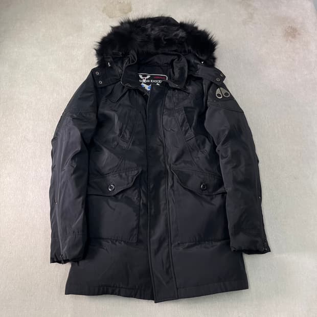 100 무스너클 스틸링 블랙 폭스퍼 구스다운 롱패딩