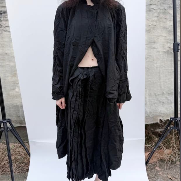 에옹쓰 Paper Wool Offbeat Pleats Skirt