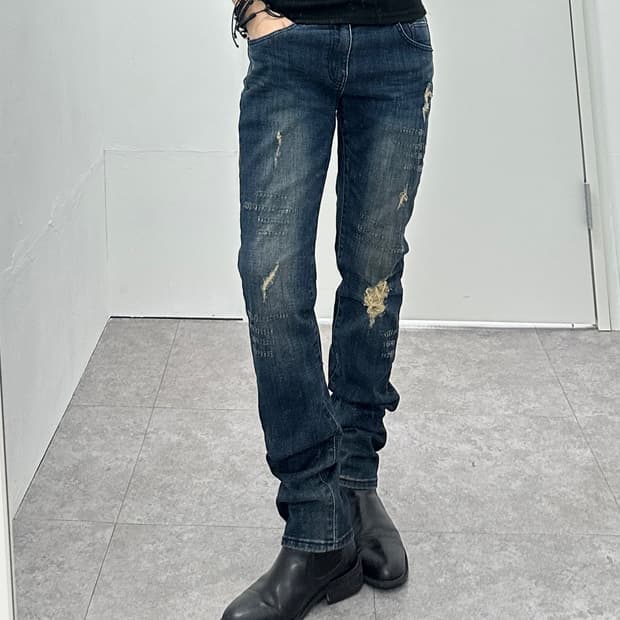 Vintage distressed denim pants