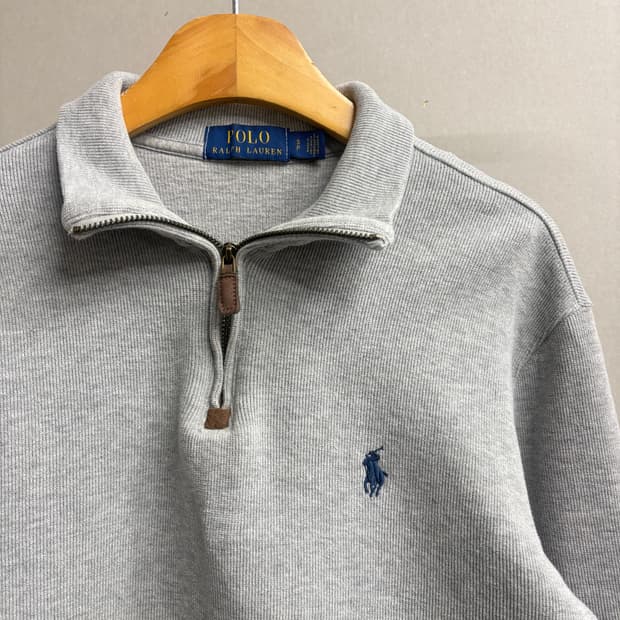 폴로 반집업 니트