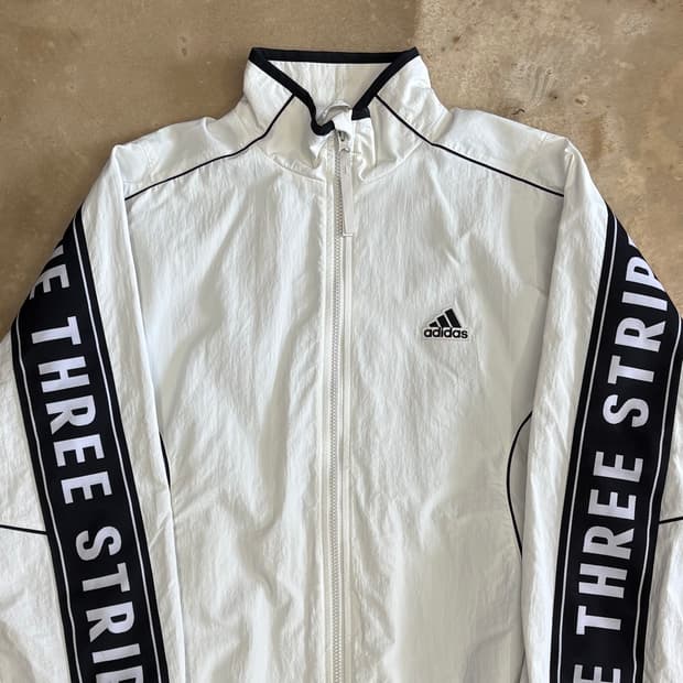 L 아디다스 레터링 라인 우븐 바람막이