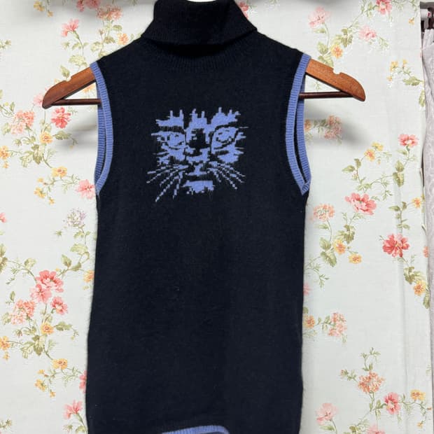 니트 슬리브리스 목폴라