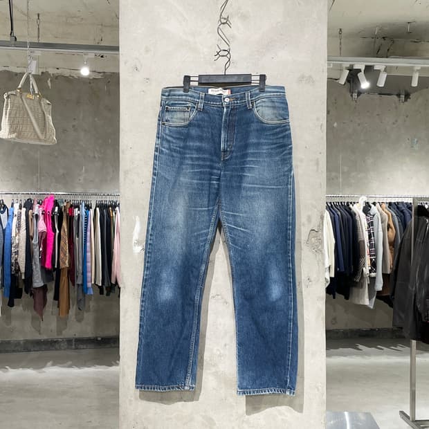 리바이스 505 중청 레귤러 핏 캣 워싱 데님 팬츠