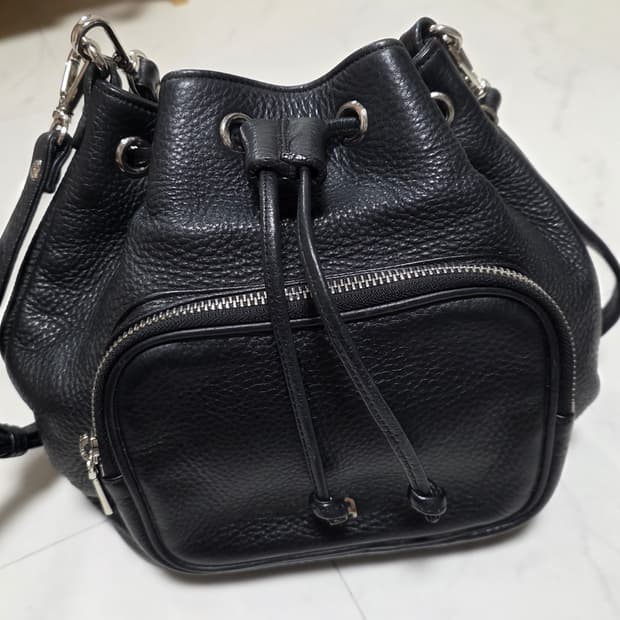 에디네띠 버킷백