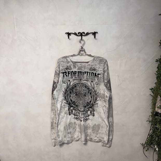 Archaic destroyed tie dye over loose t