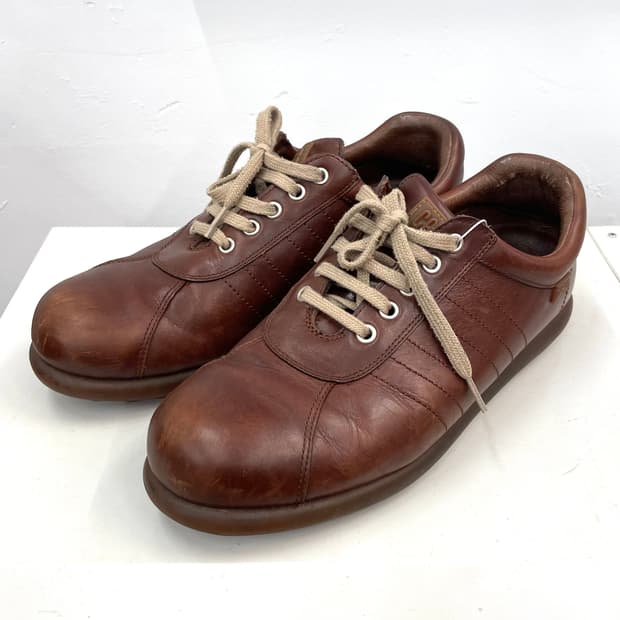 [270] 캠퍼 브라운 레더 스니커즈