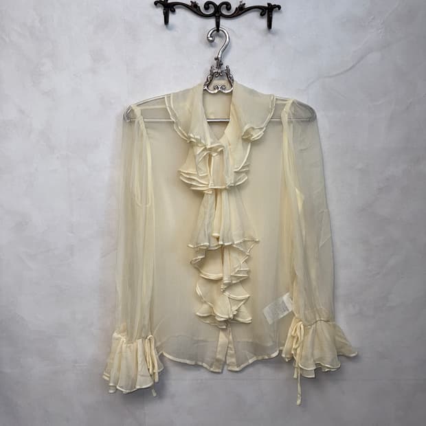 Ivory ruffle button silk blouse 