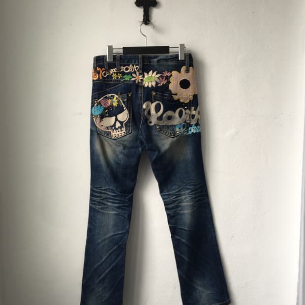 Back needle work point denim pants