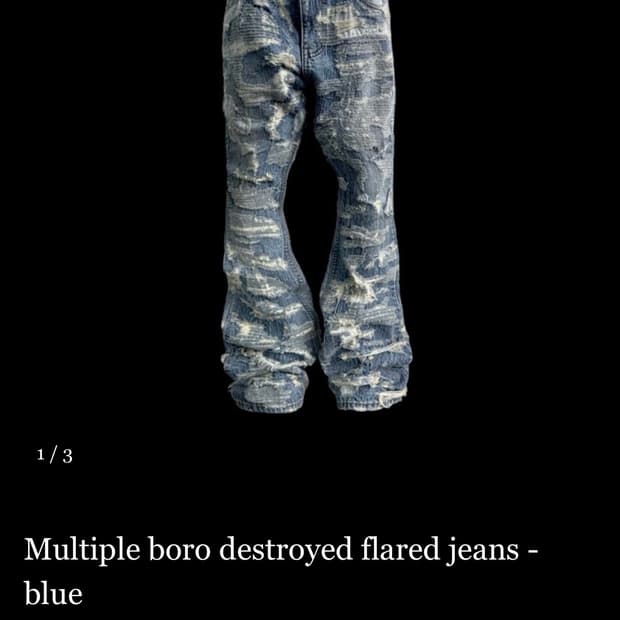 Multiple boro destroyed flared jeans - b