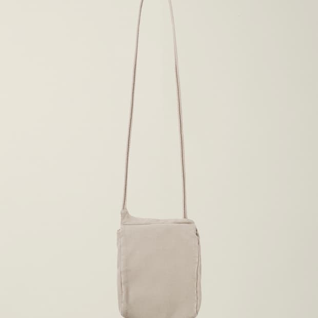 누마레 ee GARMENT DYED CROSS BAG BEIGE
