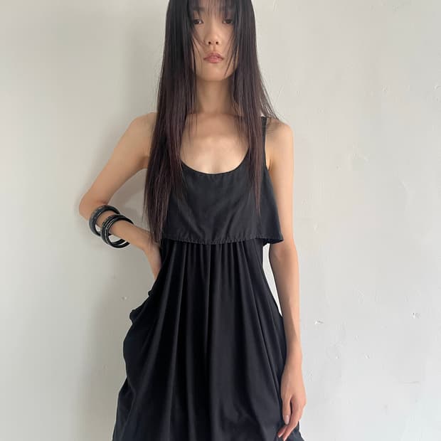 draped long sleeveless