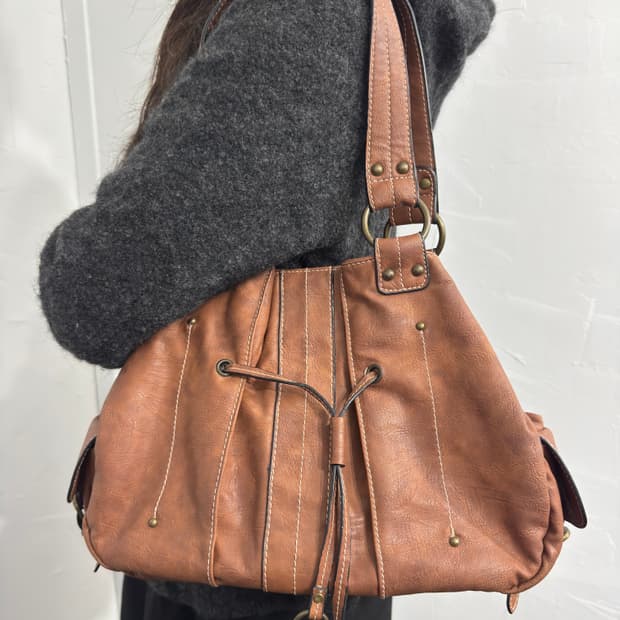 brown leather fringe pocketbag