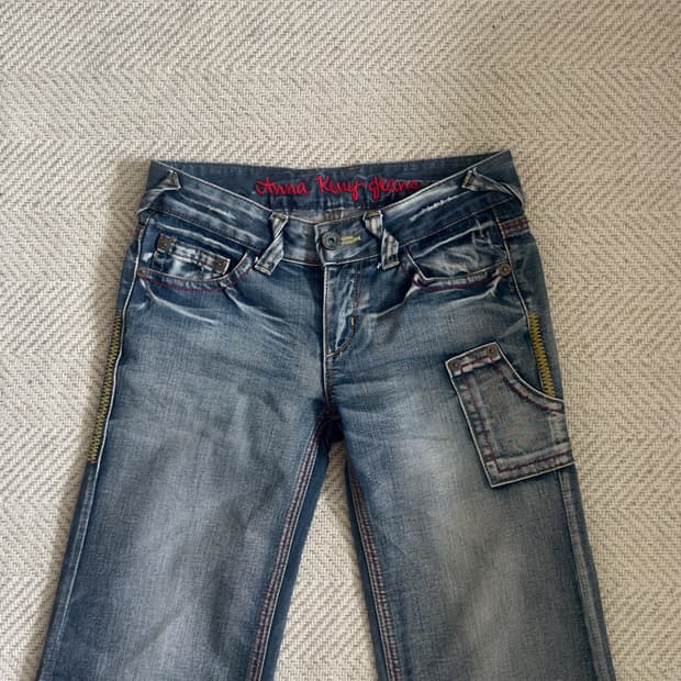 ANNA KERRY JEANS 수퍼로우라이즈 워싱 데님 부츠컷