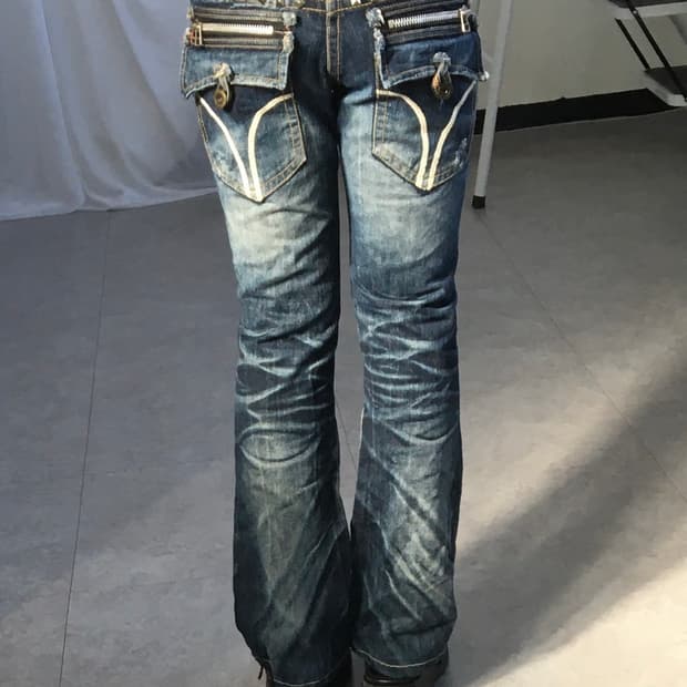 Stud point washing denim pants