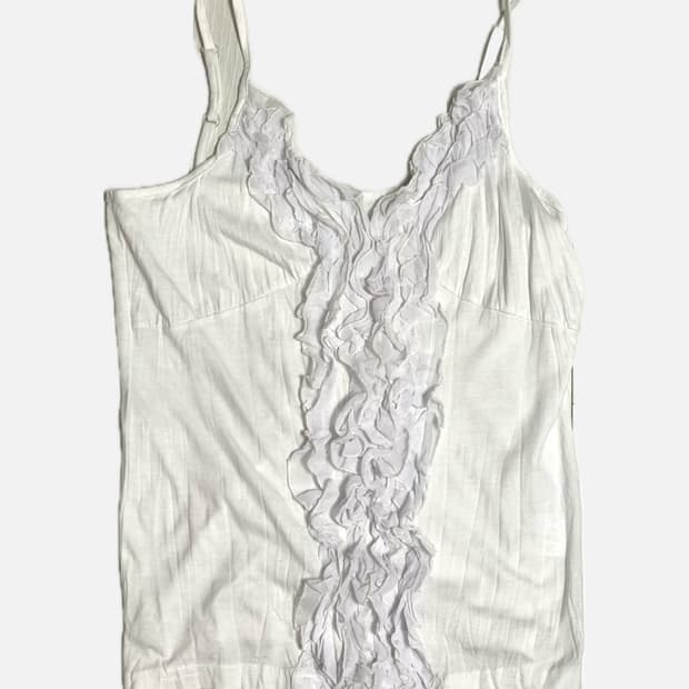 화이트 러플 슬리브리스